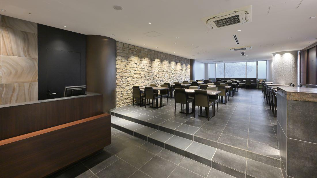 Modern hotel lounge featuring elegant seating and warm lighting